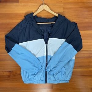 Blue and white windbreaker jacket with hood